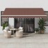 Toldo retráctil manual con luz LED marrón 450x300