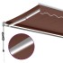 Toldo retráctil manual con luces LED marrón 500x300