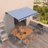 Toldo automático retráctil azul y blanco 450x350