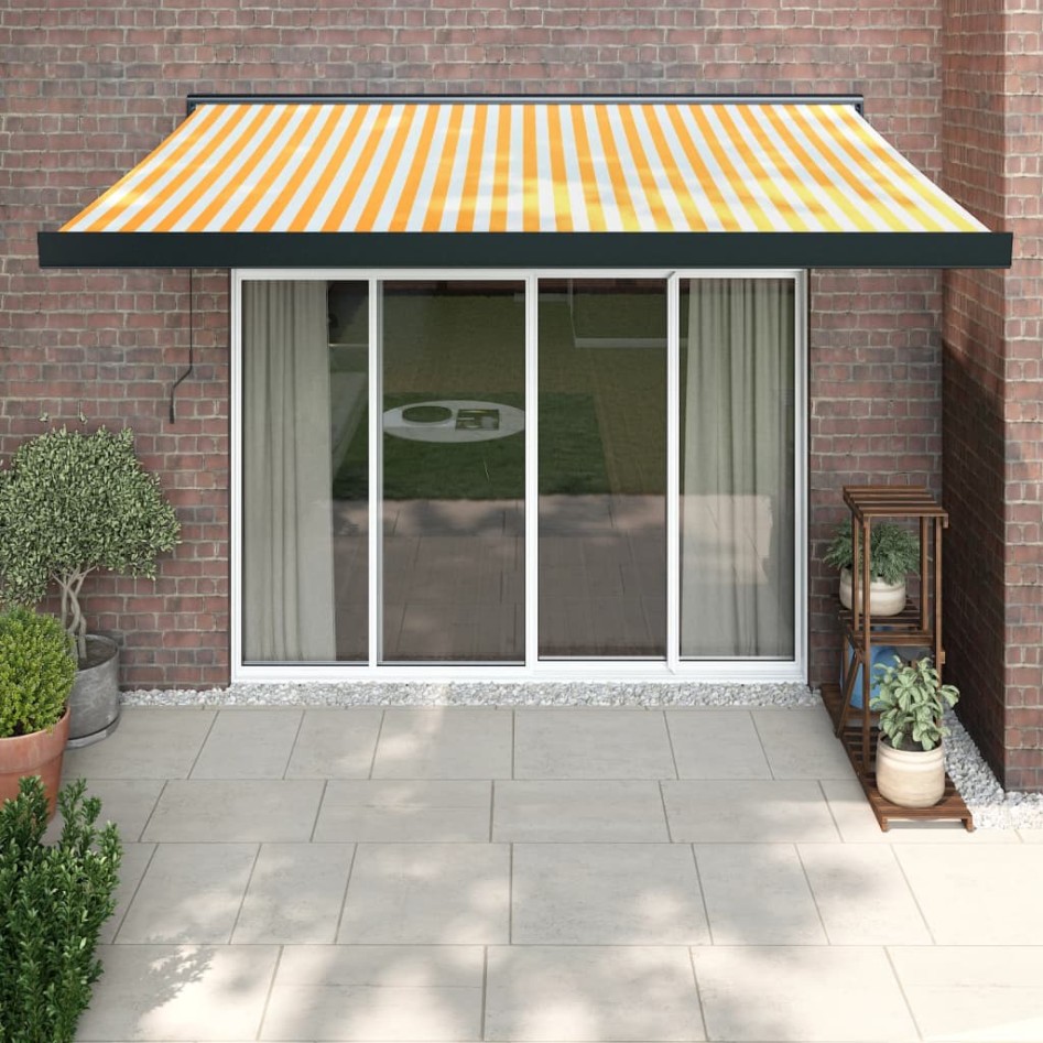 Toldo retráctil aluminio y tela amarillo y blanco 3,5x2,5