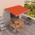 Toldo automático retráctil naranja y marrón 450x350