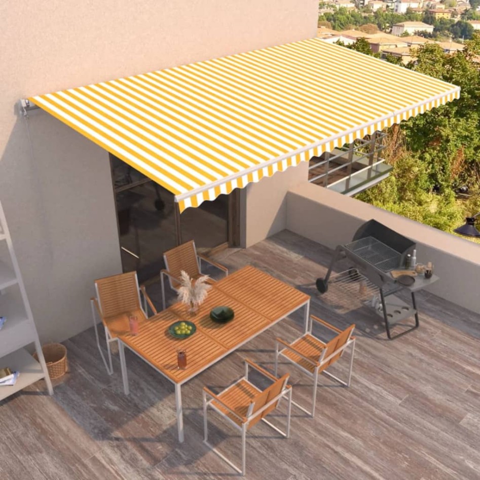 Toldo retráctil manual amarillo y blanco 600x350