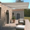 Toldo retráctil manual con LED color crema 350x250 cm