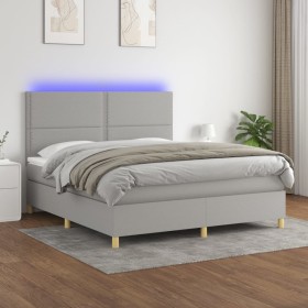 Cama box spring colchón y luces LED tela gris claro 160x200