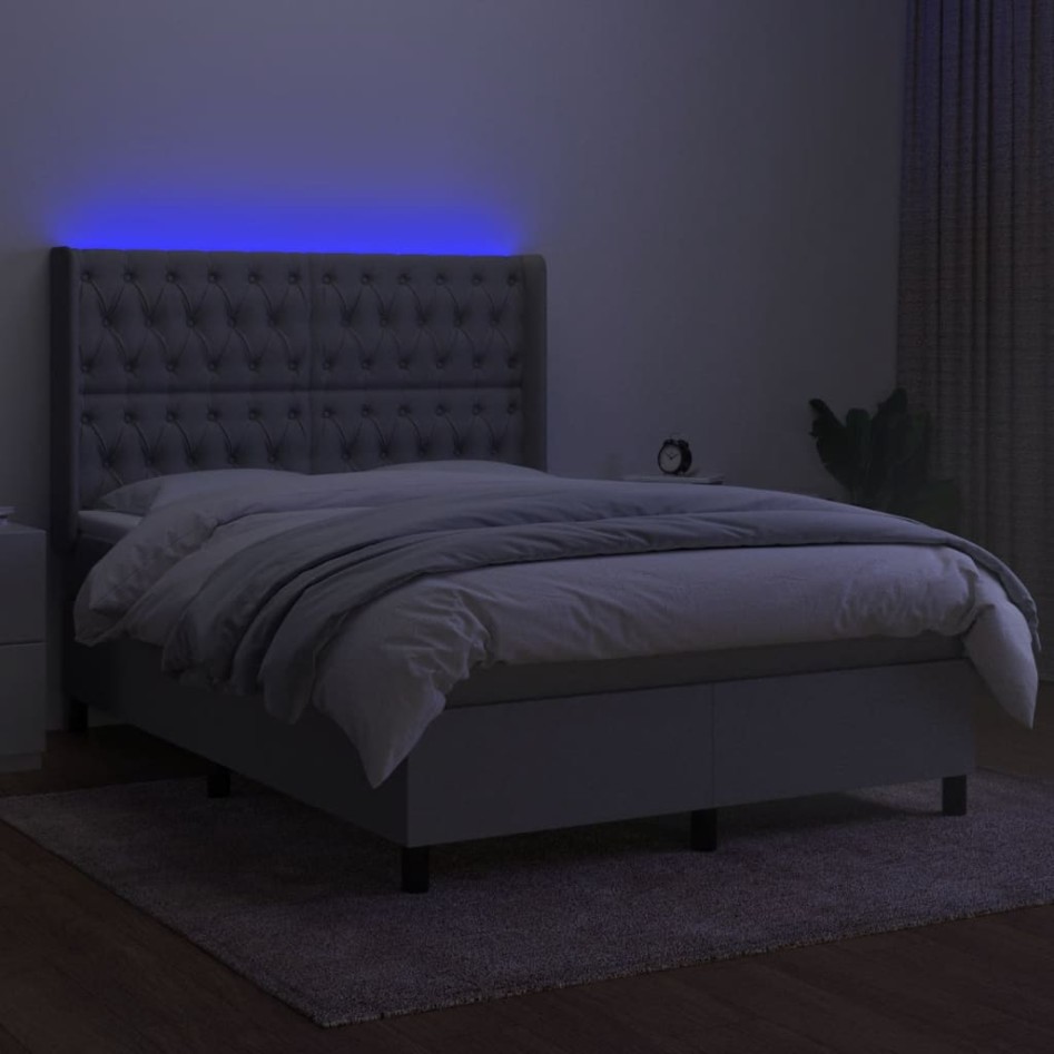 Cama box spring colchón y luces LED tela gris claro 140x200