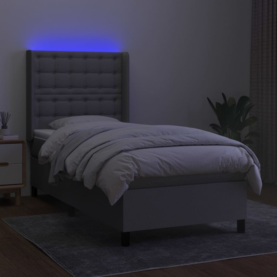 Cama box spring colchón y luces LED tela gris claro 90x200