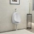 Urinario de pared con válvula de descarga cerámica