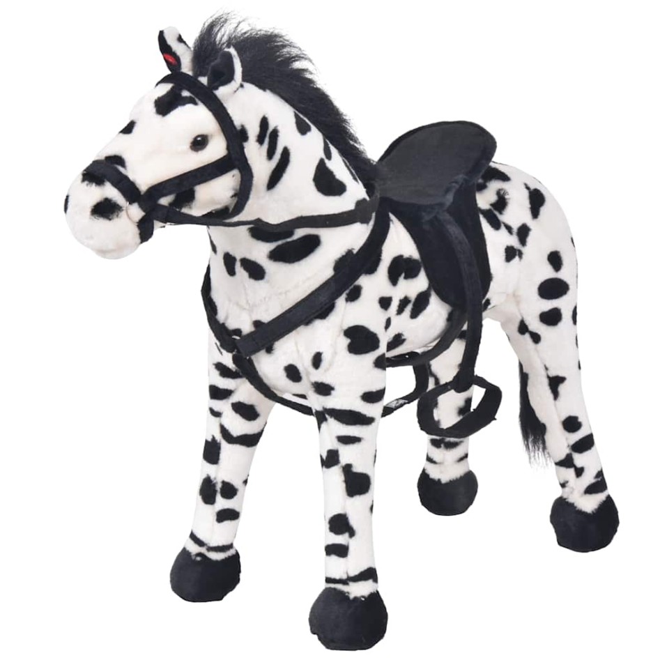 Caballo de peluche de pie negro y blanco