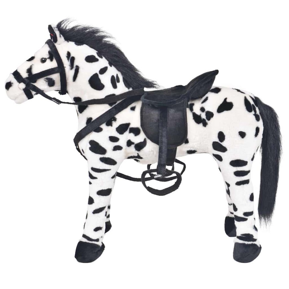 Caballo de peluche de pie negro y blanco