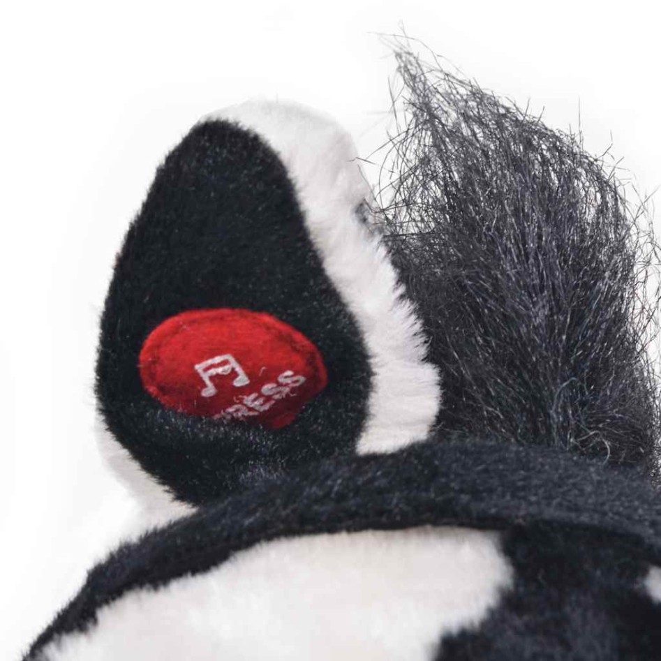 Caballo de peluche de pie negro y blanco