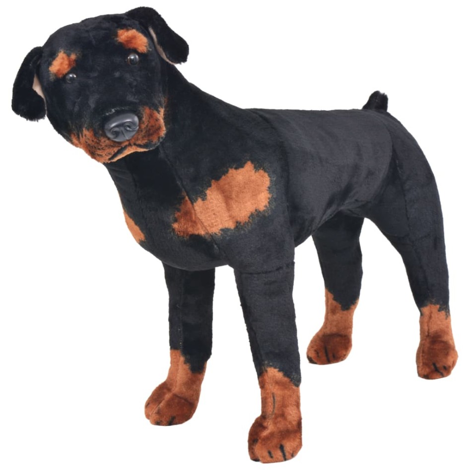 Perro rottweiler de peluche de pie negro y marrón