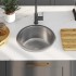 Fregadero de cocina con colador y sifón de acero
