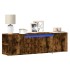 Mueble de TV de pared luces LED roble ahumado 135x31x39,5