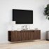Mueble de TV de pared con luces LED marrón roble 135x31x39,5