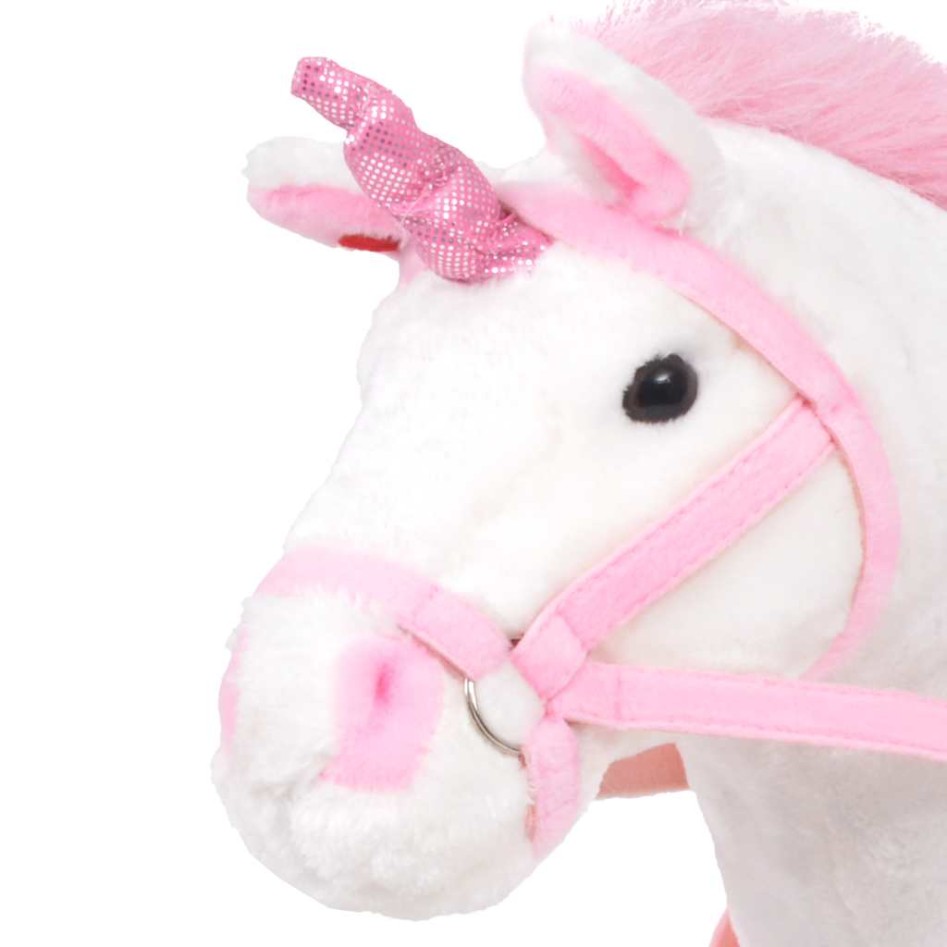 Unicornio de peluche de pie blanco y rosa