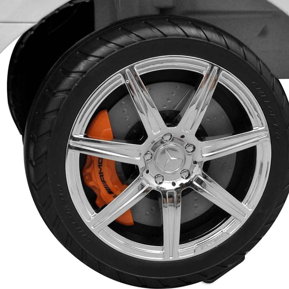 Coche de niños accionado con el pie