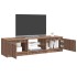 Mueble de TV con luces LED marrón roble 140x40x35,5