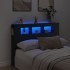 Cabecero con LED madera de ingeniería negro 140x18,5x103,5