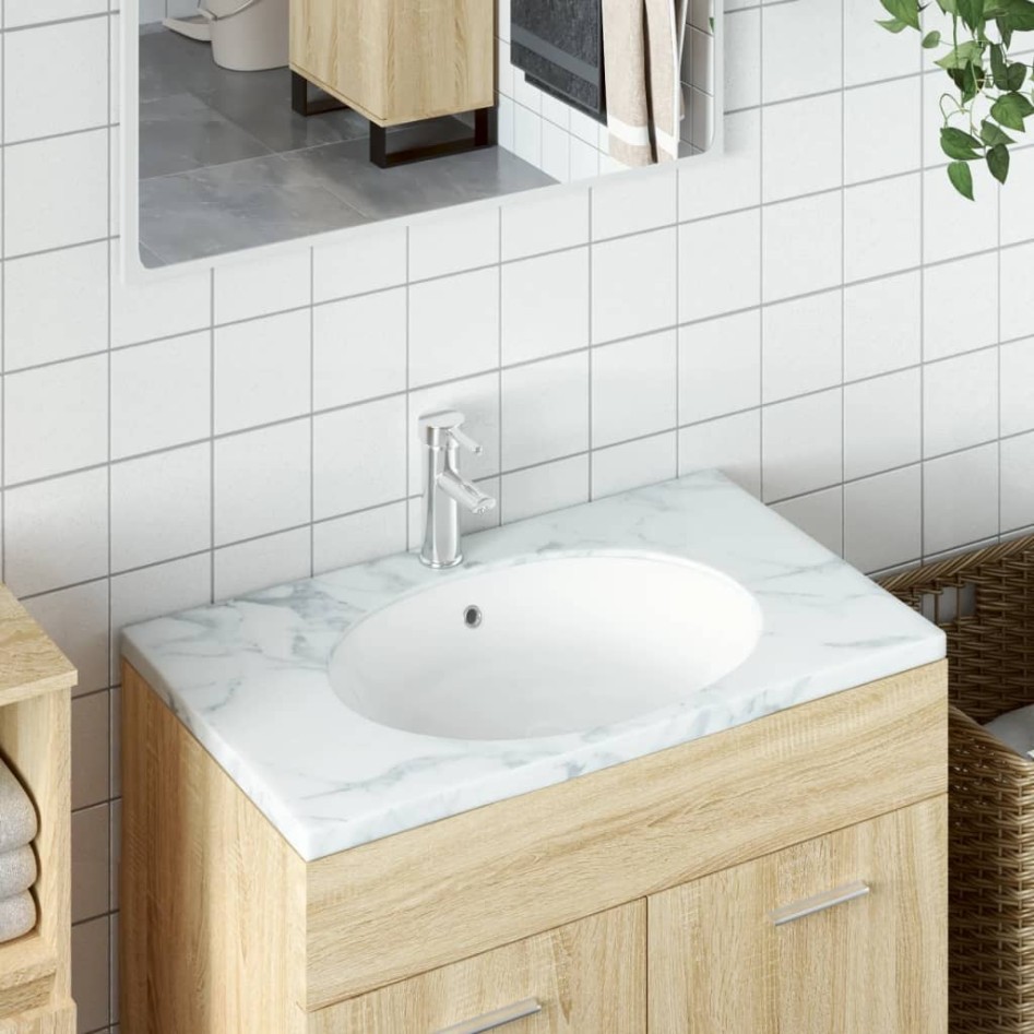 Lavabo de baño ovalado cerámica blanco 47x39x21