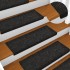 Alfombrilla de escaleras 15 uds tela punzonada negro 65x21x4