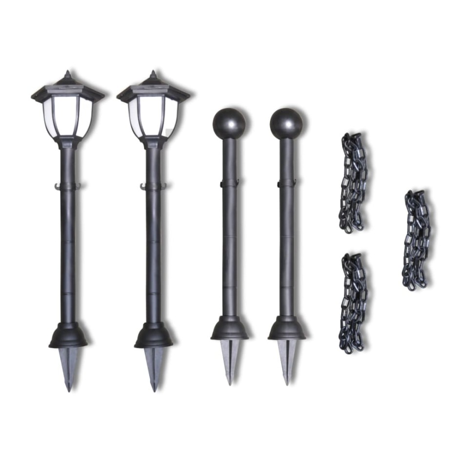 Lámparas solares de jardín con valla de