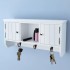 Armario de pared para llaves y joyas con puertas y