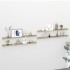 Estantes de pared 4 unidades blanco y roble Sonoma 115x9x3