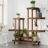 Soporte de flores con ruedas madera maciza abeto 95x25x101