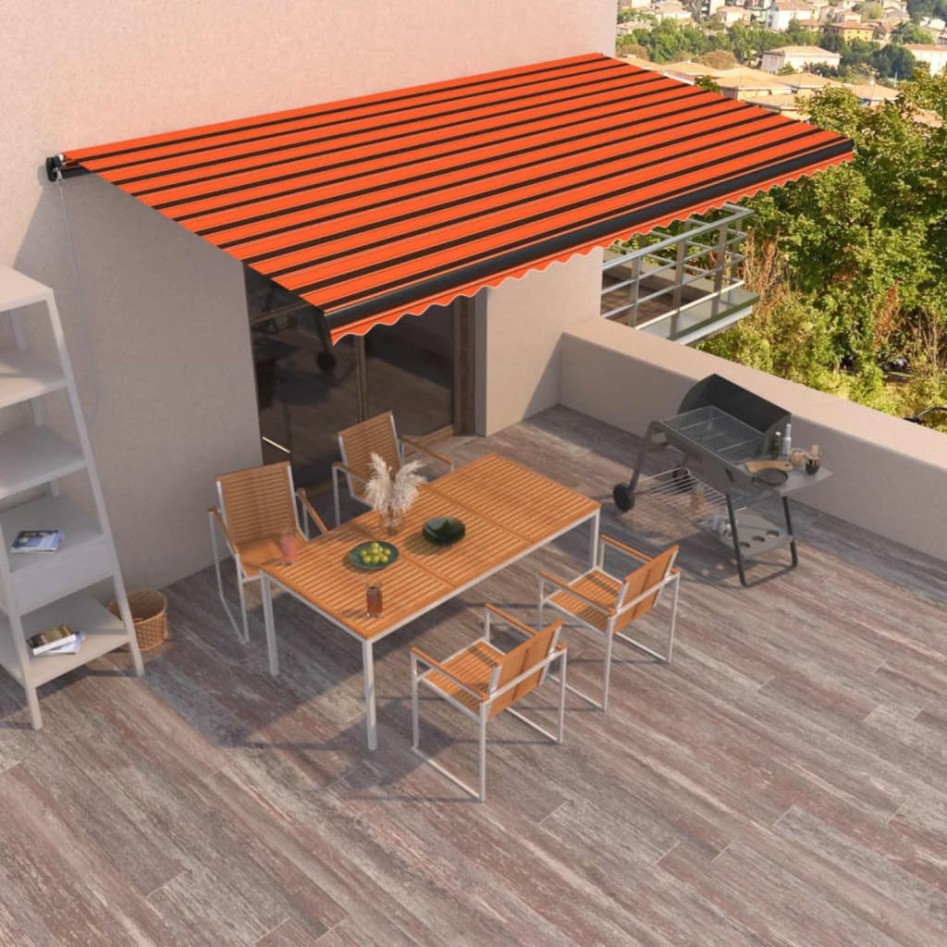 Toldo retráctil manual naranja y marrón 600x350