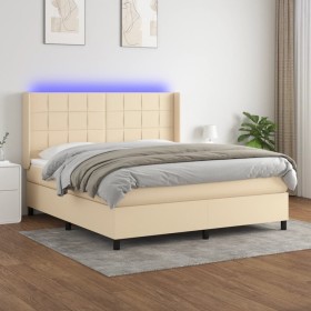 Cama box spring colchón y luces LED tela crema 160x200