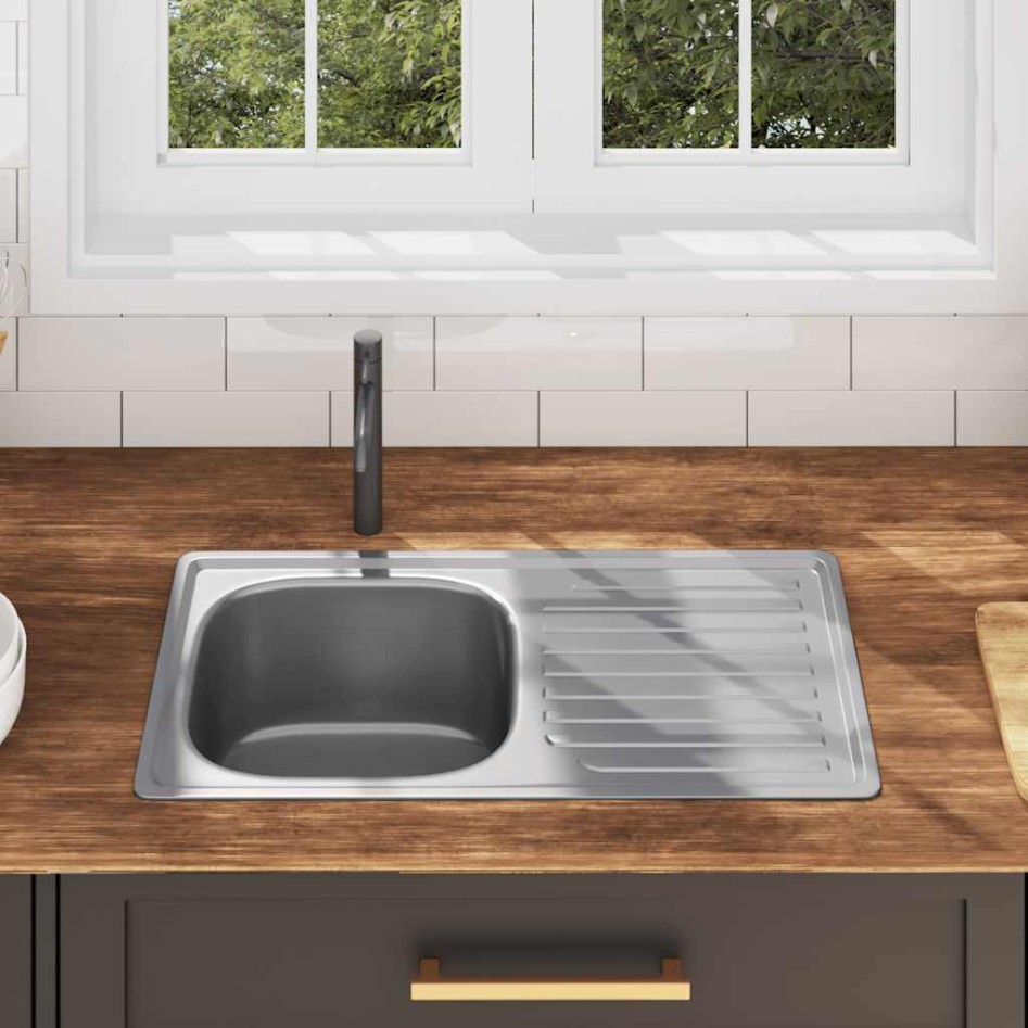 Fregadero de cocina con colador y sifón de acero