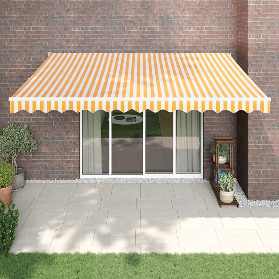 Toldo retráctil aluminio y tela amarillo y blanco 4,5x3