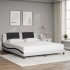 Estructura de cama con luz LED cuero PE blanco negro 180x200
