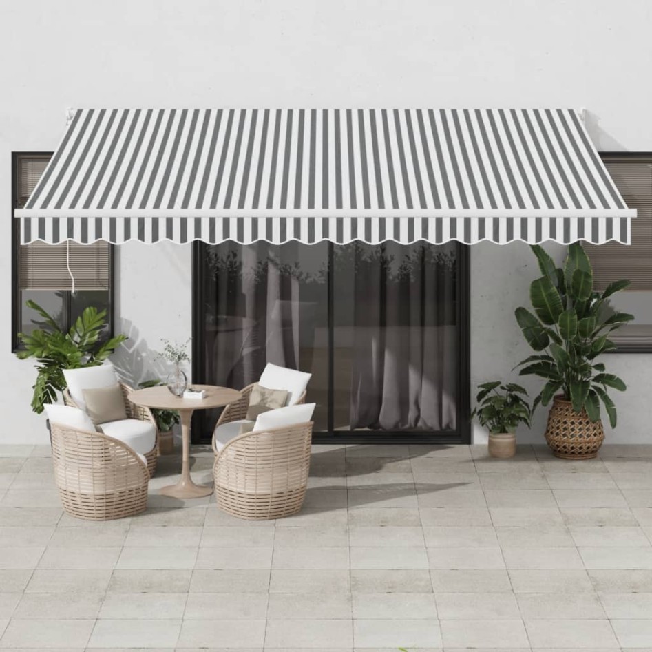 Toldo retráctil aluminio y tela gris antracita y blanco 4,5x3