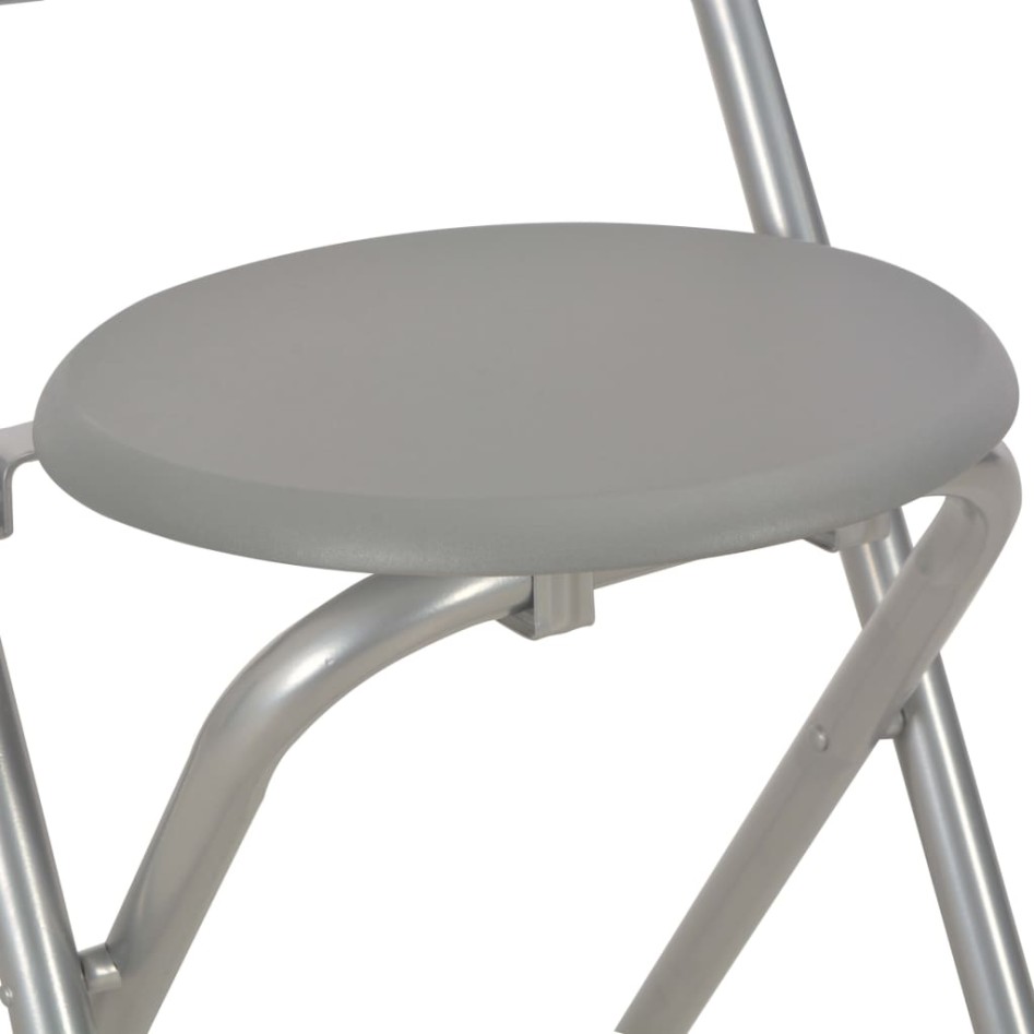 Mesa y taburetes de cocina con estantes de madera y acero