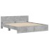 Estructura de cama con cabecero gris hormigón