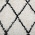 Alfombra de pelo largo moderna crema y negro Ø 280