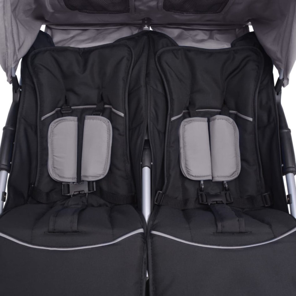 Cochecito gemelar de acero gris y