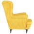 Sillón de terciopelo amarillo