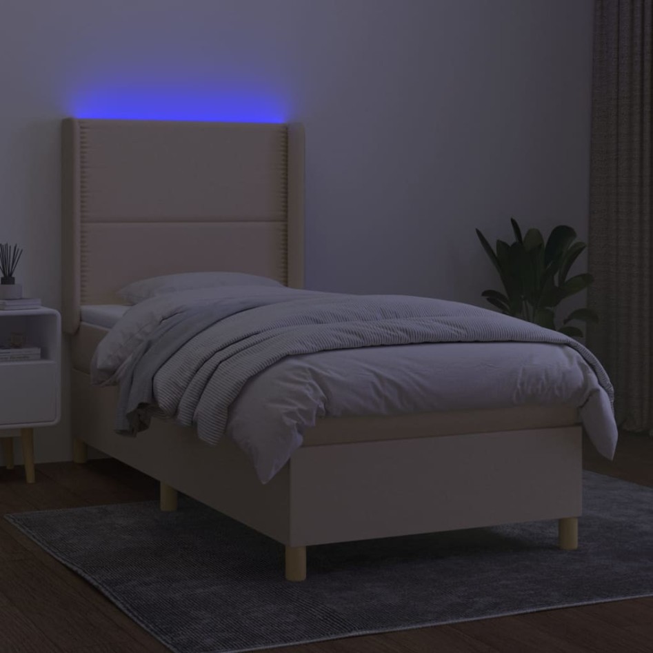 Cama box spring colchón y luces LED tela crema 90x200