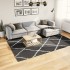 Alfombra de pelo largo moderna negro y crema 200x280