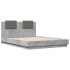 Estructura de cama cabecero luces LED gris hormigón 140x200