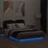 Estructura de cama con cabecero y luces LED negro 140x190