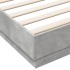 Estructura de cama con luces LED gris hormigón 180x200