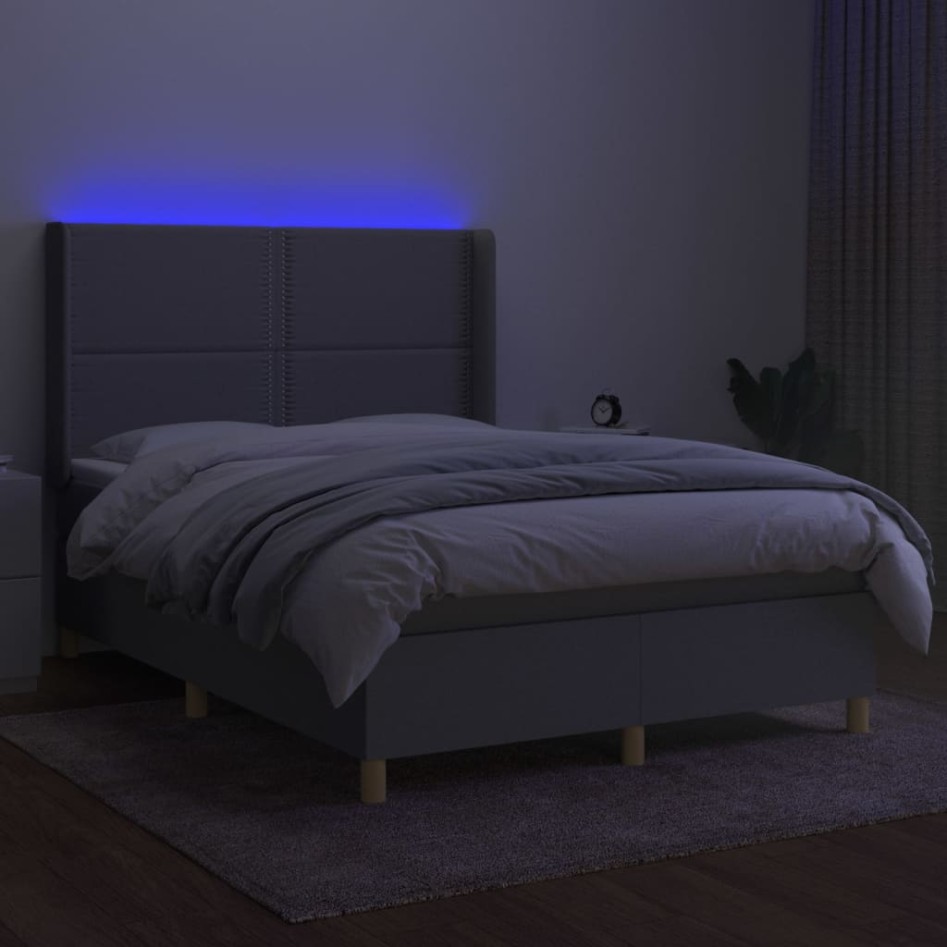 Cama box spring colchón y luces LED tela gris claro 140x200