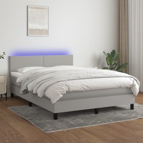 Cama box spring con colchón tela y LED gris claro 140x200