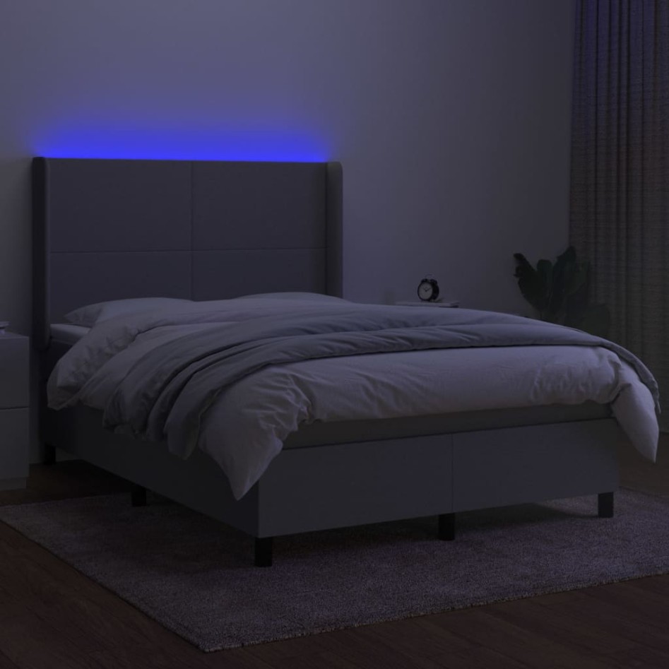 Cama box spring colchón y luces LED tela gris claro 140x200
