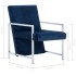 Sillón con patas cromadas de terciopelo