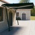 Toldo retráctil manual con LED gris antracita 4,5x3