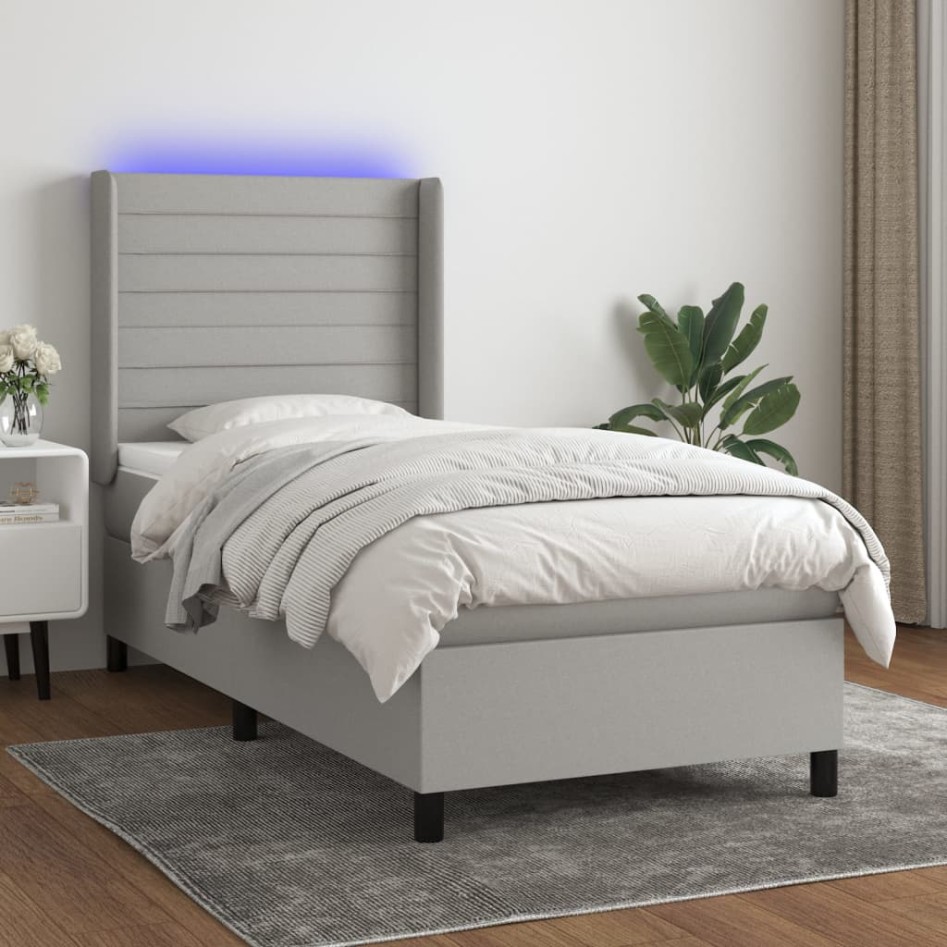Cama box spring colchón y luces LED tela gris claro 90x200